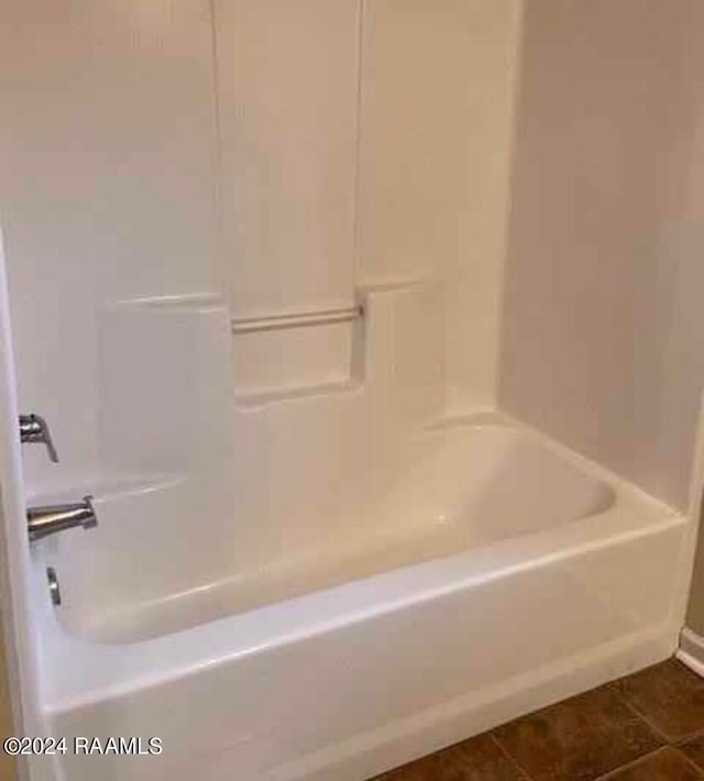 bathroom with shower / bathtub combination and tile patterned floors