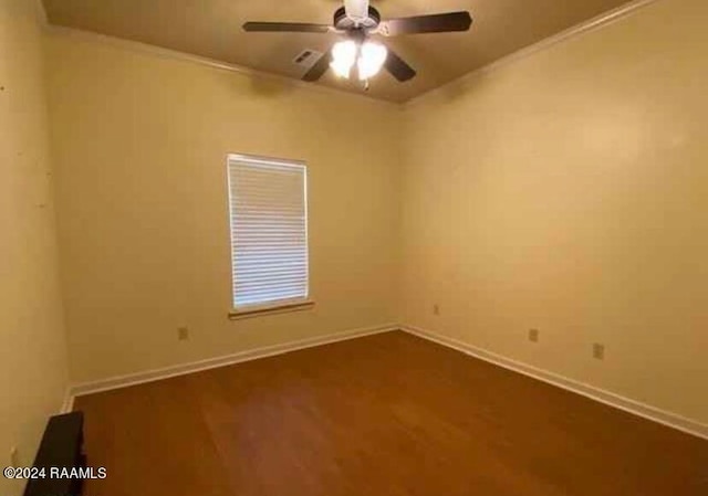 spare room with ceiling fan and hardwood / wood-style flooring