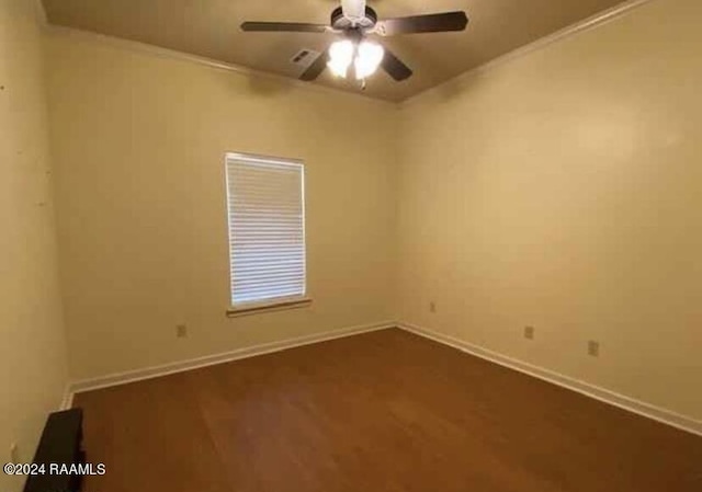 147 Oakbend Dr, Lafayette, LA 70506 - spare room with ceiling fan, ornamental molding, baseboards, and dark wood-type flooring