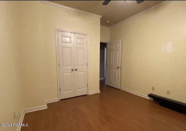 147 Oakbend Dr, Lafayette, LA 70506 - empty room with a ceiling fan, baseboards, dark wood-style floors, and ornamental molding