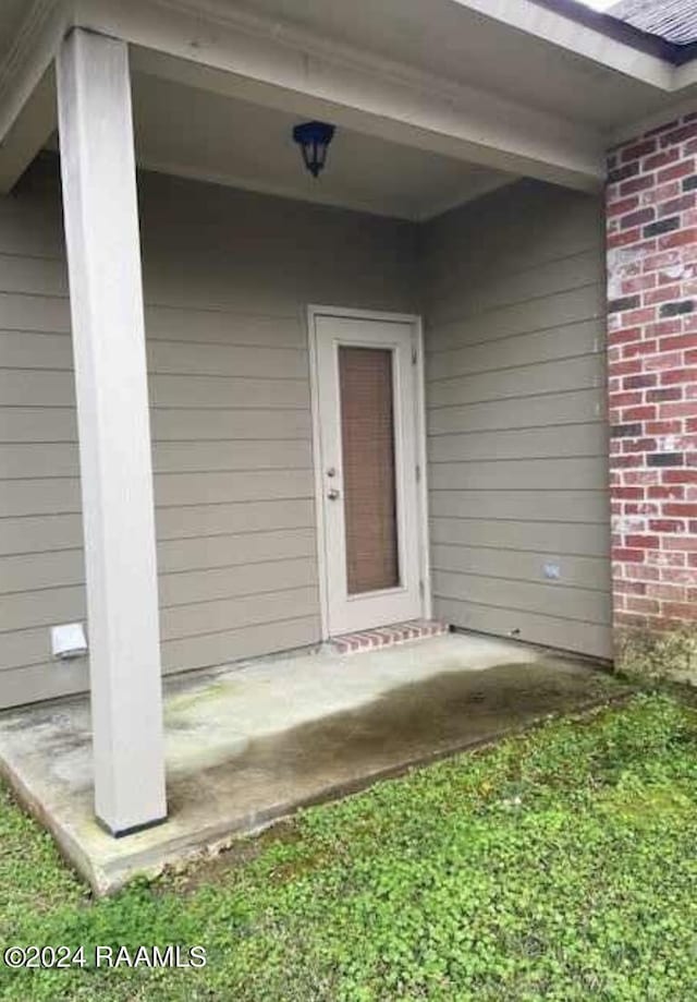 147 Oakbend Dr, Lafayette, LA 70506 - entrance to property with brick siding