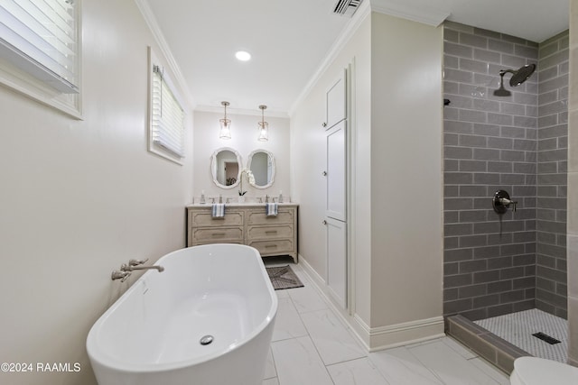 bathroom featuring vanity, crown molding, and shower with separate bathtub