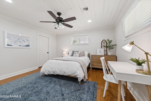 bedroom with dark hardwood / wood-style flooring, ceiling fan, crown molding, and wood ceiling