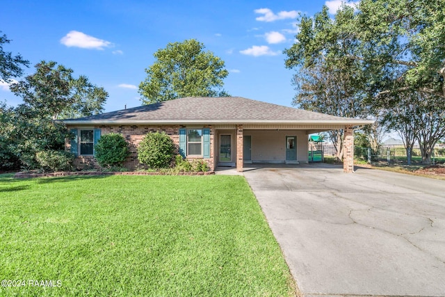 ranch-style house with a carport and a front yard