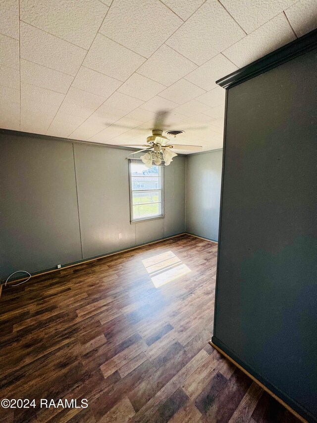 205 Gauraud St, Abbeville, LA 70510 - spare room with ceiling fan and wood finished floors