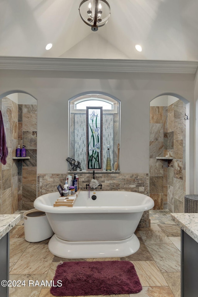 bathroom featuring ornamental molding and vanity