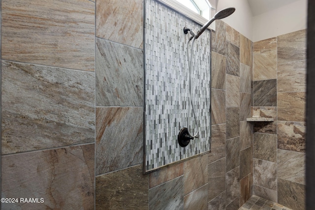 details with a tile shower