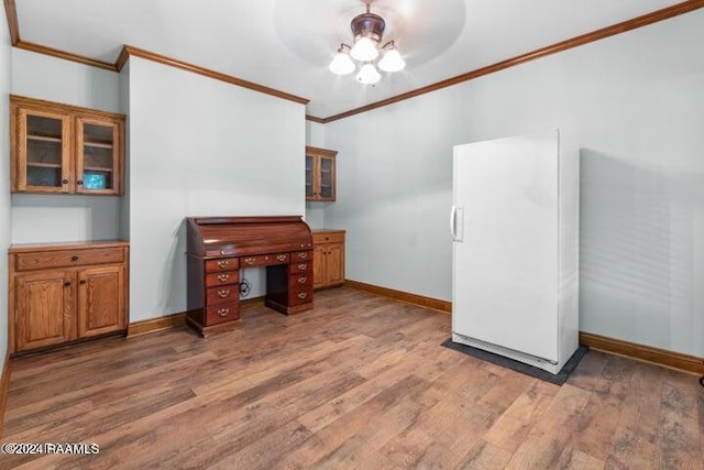 office space featuring ceiling fan, dark hardwood / wood-style floors, and ornamental molding