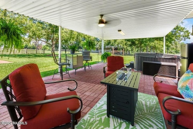 view of patio / terrace featuring a hot tub