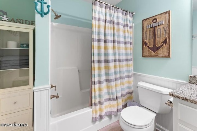 full bathroom with vanity, toilet, and shower / bathtub combination with curtain