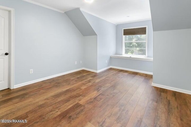 bonus room with hardwood / wood-style floors