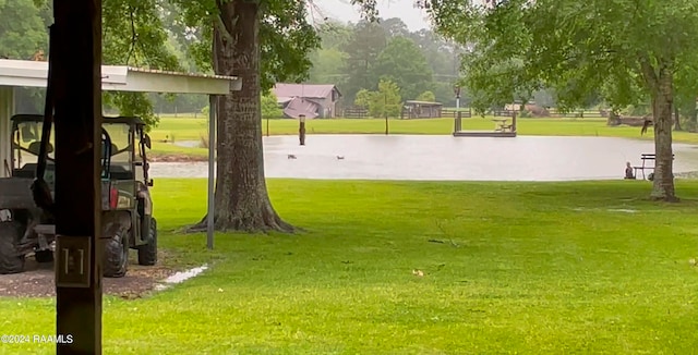 view of community featuring a lawn