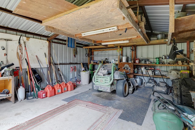 135 Woodys Ln, Sunset, LA 70584 - garage with a workshop area and metal wall
