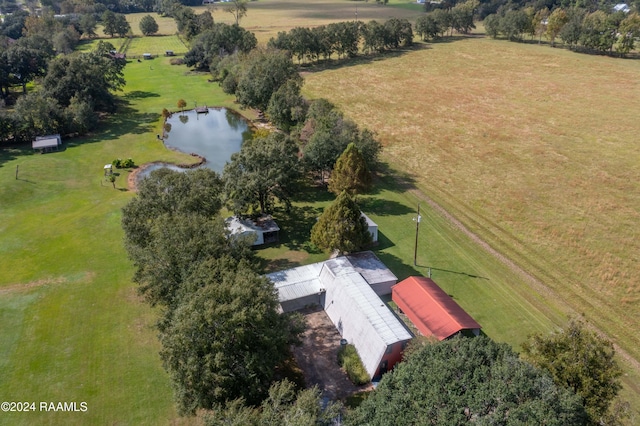 bird's eye view with a water view and a rural view