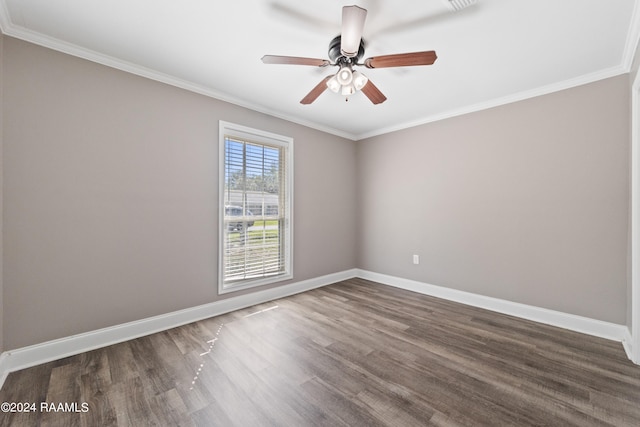 empty room featuring crown molding, ceiling fan, and dark hardwood / wood-style flooring