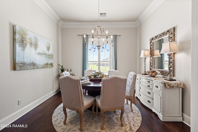 dining room featuring ornamental molding, dark wood-type flooring, and a chandelier