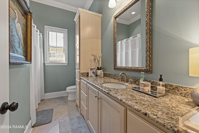 bathroom with vanity, crown molding, toilet, and tile patterned floors