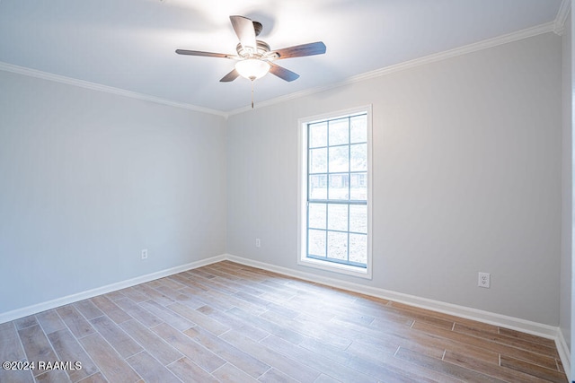 unfurnished room featuring light hardwood / wood-style floors, ceiling fan, and crown molding