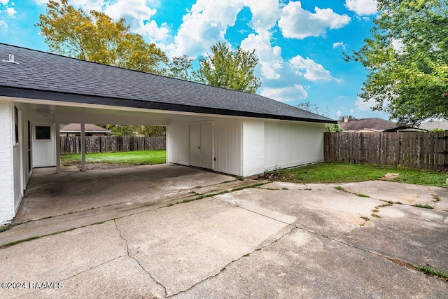 garage featuring a yard