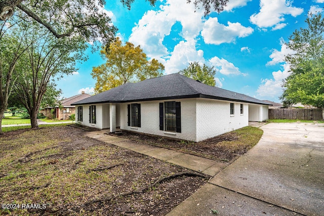 view of property exterior with a patio