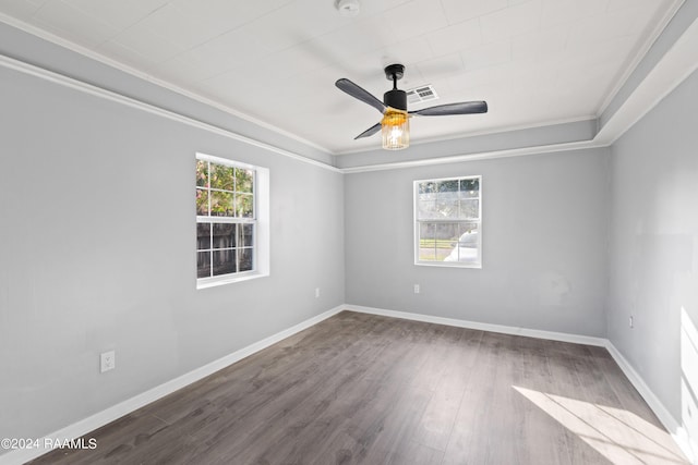 406 Orange Grove Ave, New Iberia, LA 70560 - spare room featuring crown molding, wood finished floors, a ceiling fan, and baseboards