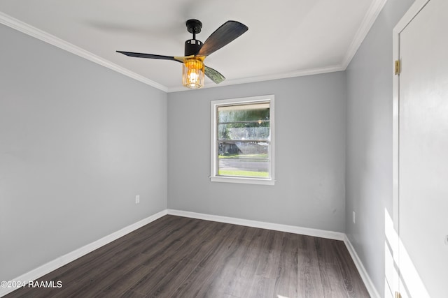 spare room with crown molding, ceiling fan, and dark wood-type flooring