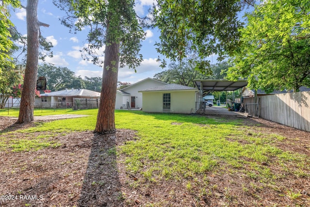 view of yard featuring a carport