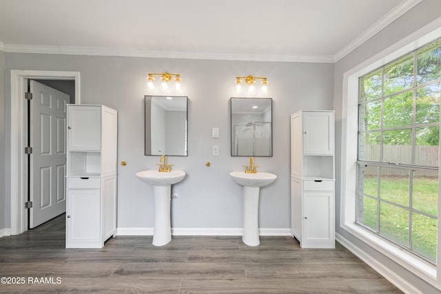 406 Orange Grove Ave, New Iberia, LA 70560 - full bathroom with crown molding, baseboards, and wood finished floors