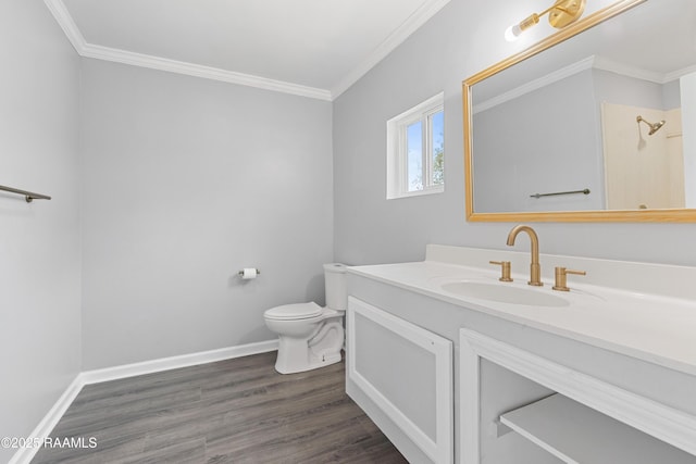 406 Orange Grove Ave, New Iberia, LA 70560 - bathroom featuring toilet, crown molding, vanity, wood finished floors, and baseboards