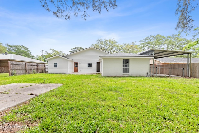 406 Orange Grove Ave, New Iberia, LA 70560 - back of property featuring a patio area