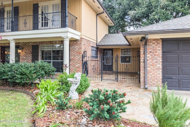 property entrance featuring a garage