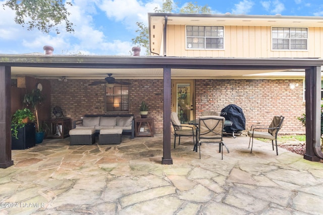 view of patio / terrace featuring an outdoor hangout area, a grill, and ceiling fan