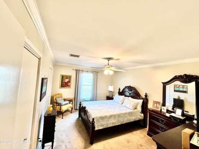 carpeted bedroom with crown molding and ceiling fan