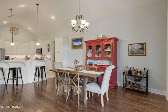 dining area featuring a chandelier, dark hardwood / wood-style flooring, and high vaulted ceiling