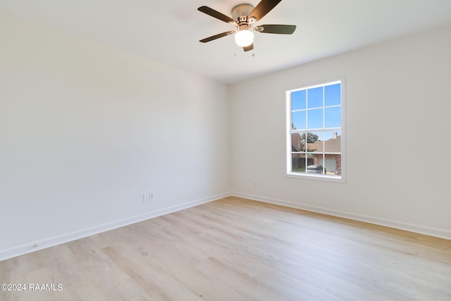 unfurnished room featuring ceiling fan and light hardwood / wood-style flooring