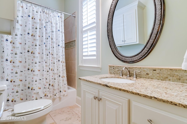 full bathroom with shower / tub combo, toilet, tile patterned floors, backsplash, and vanity