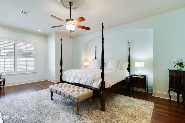 bedroom featuring crown molding, ceiling fan, and dark hardwood / wood-style flooring