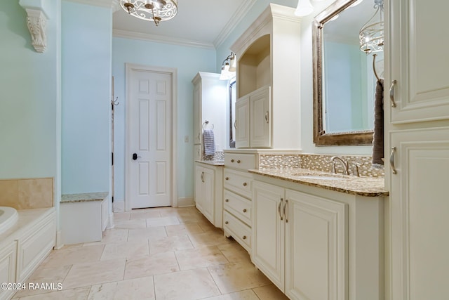 bathroom featuring tile patterned flooring, ornamental molding, a tub, and vanity