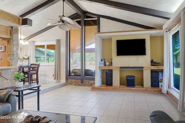 living room featuring vaulted ceiling with beams, light tile patterned floors, and ceiling fan