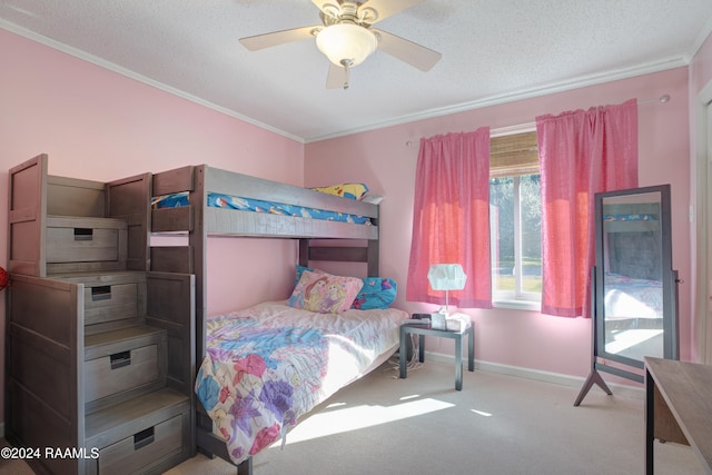 bedroom featuring ceiling fan, light carpet, ornamental molding, and a textured ceiling