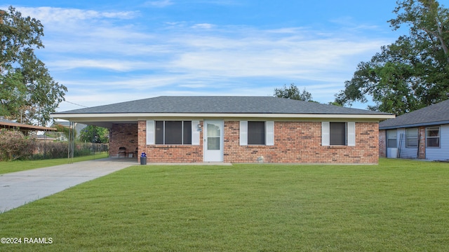 ranch-style house with a carport and a front lawn