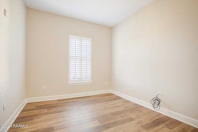201 Settlers Trace Blvd Unit 2401, Lafayette, LA 70508 - unfurnished room with light wood finished floors and baseboards