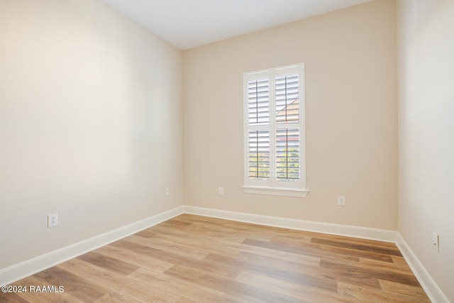 201 Settlers Trace Blvd Unit 2401, Lafayette, LA 70508 - spare room featuring light wood-style flooring and baseboards