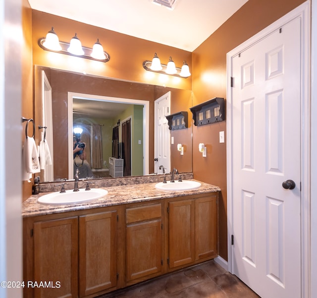 bathroom with vanity and tile patterned floors