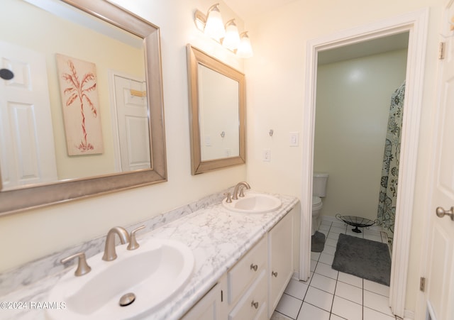 bathroom featuring vanity, a shower with curtain, toilet, and tile patterned flooring