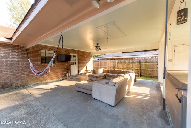 view of patio featuring an outdoor hangout area and ceiling fan