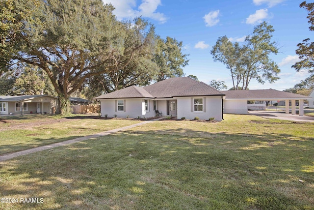 single story home with a front lawn