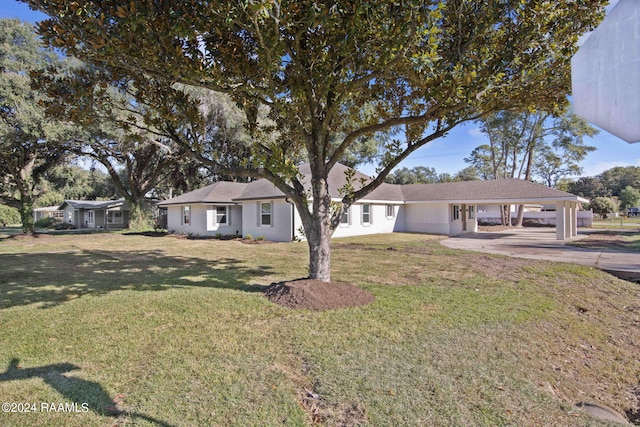 ranch-style home with a front yard