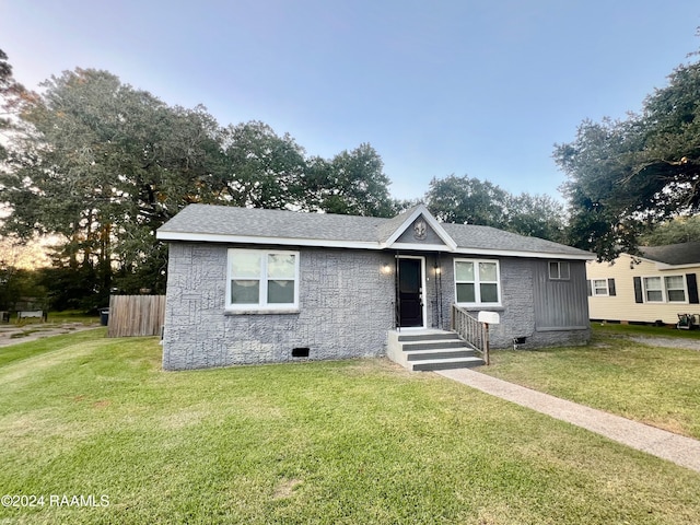 view of front of home with a front yard