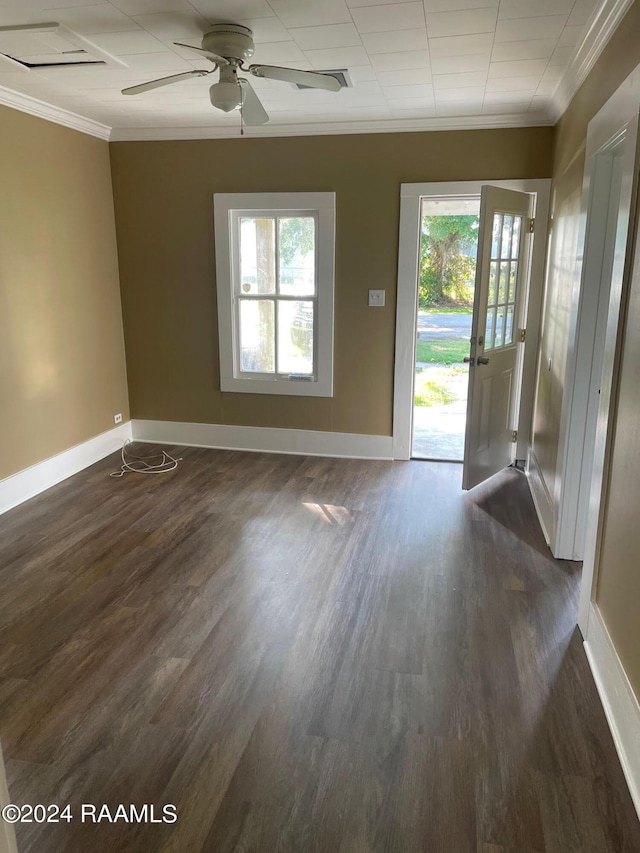 604 N Lejeune Ave, Kaplan, LA 70548 - empty room with ornamental molding, dark wood-type flooring, baseboards, and a ceiling fan